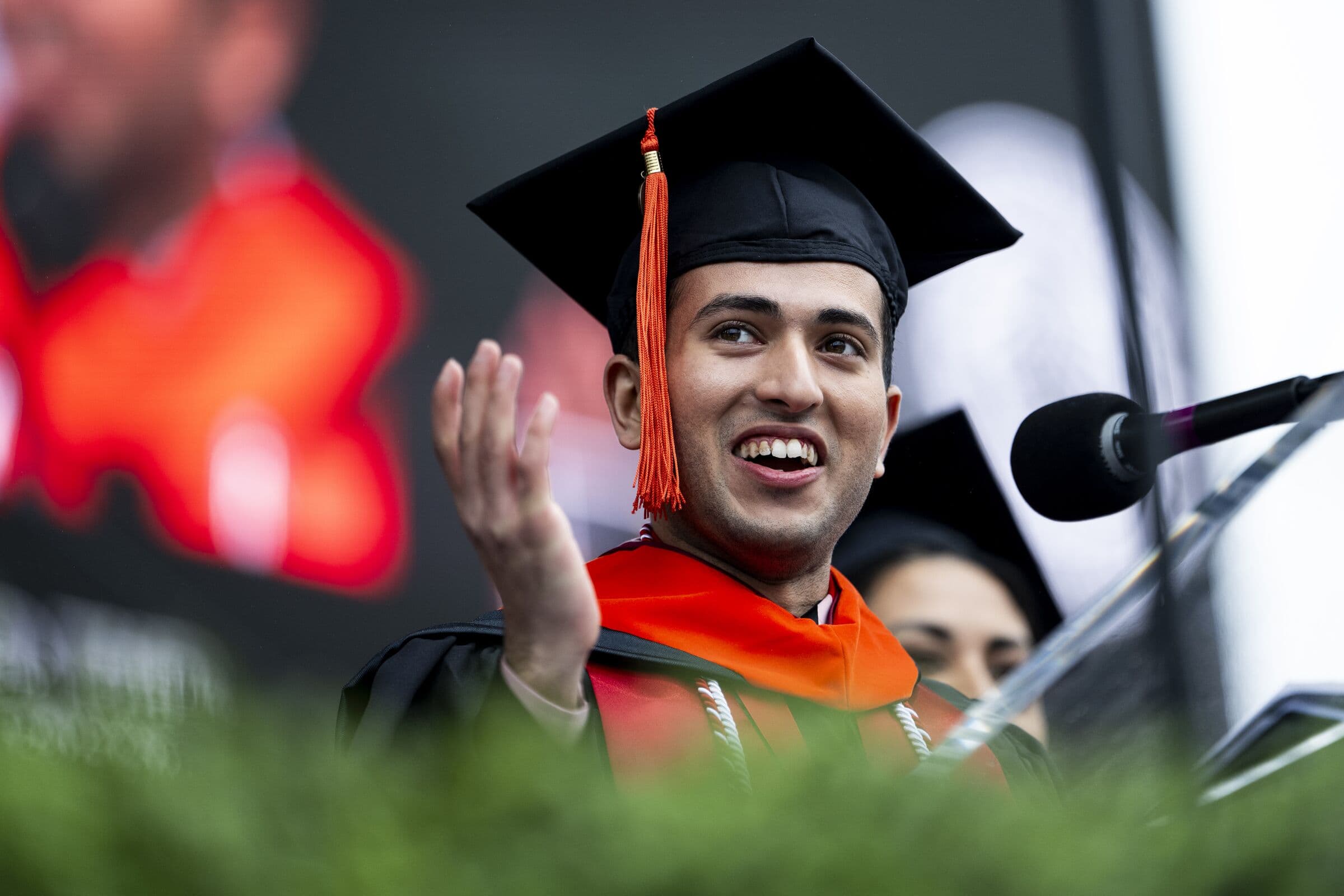 Shayan Menahi delivering the Northeastern University graduate commencement speech 2026